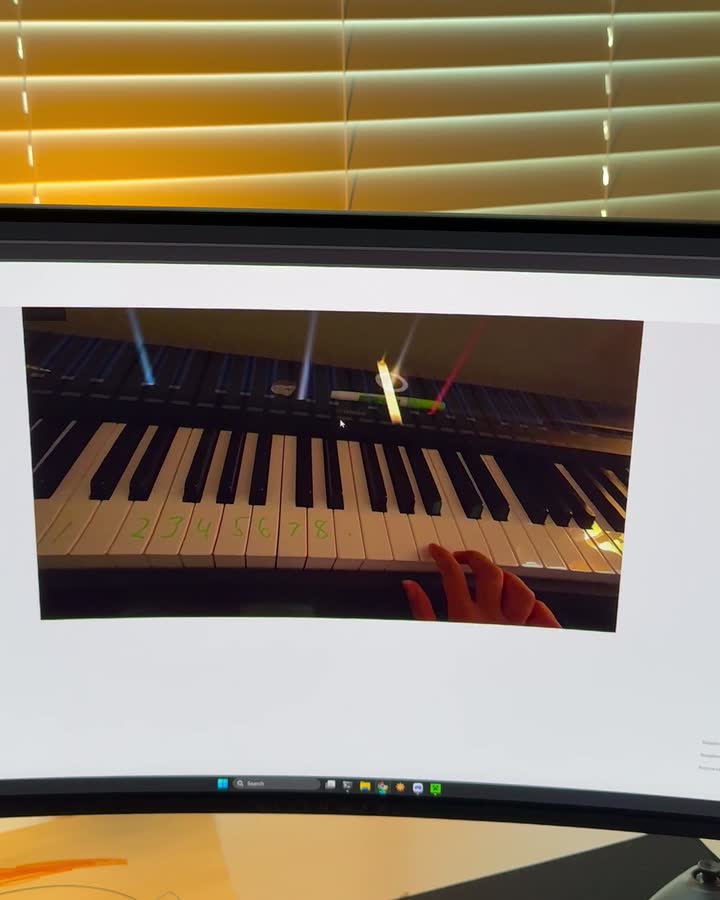 The AR piano feed on the desk monitor during a test session